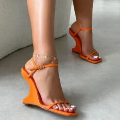 Aja Orange Square Toe Strappy Patent Wedges