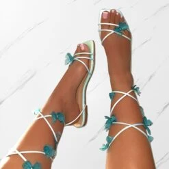 Emerald Blue Butterfly Lace Up Flat Sandals